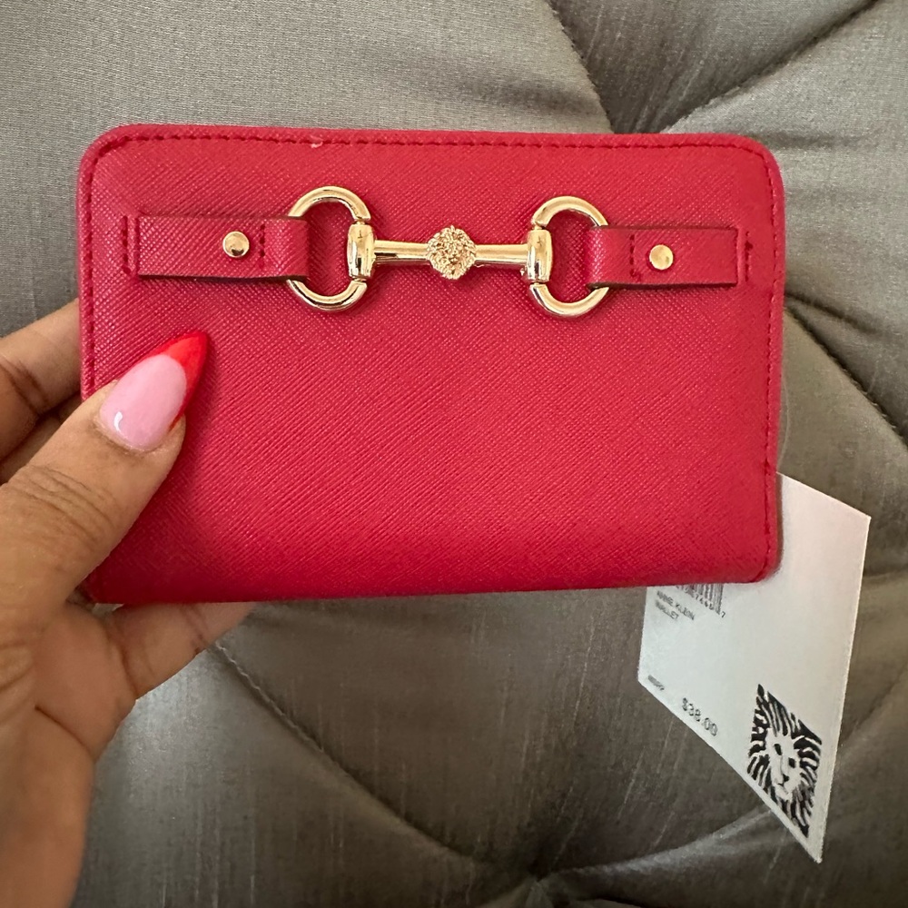 COPY - Anne Klein Crimson Wallet
5.25” x 3.50 “
Gold Emblems
Brand New